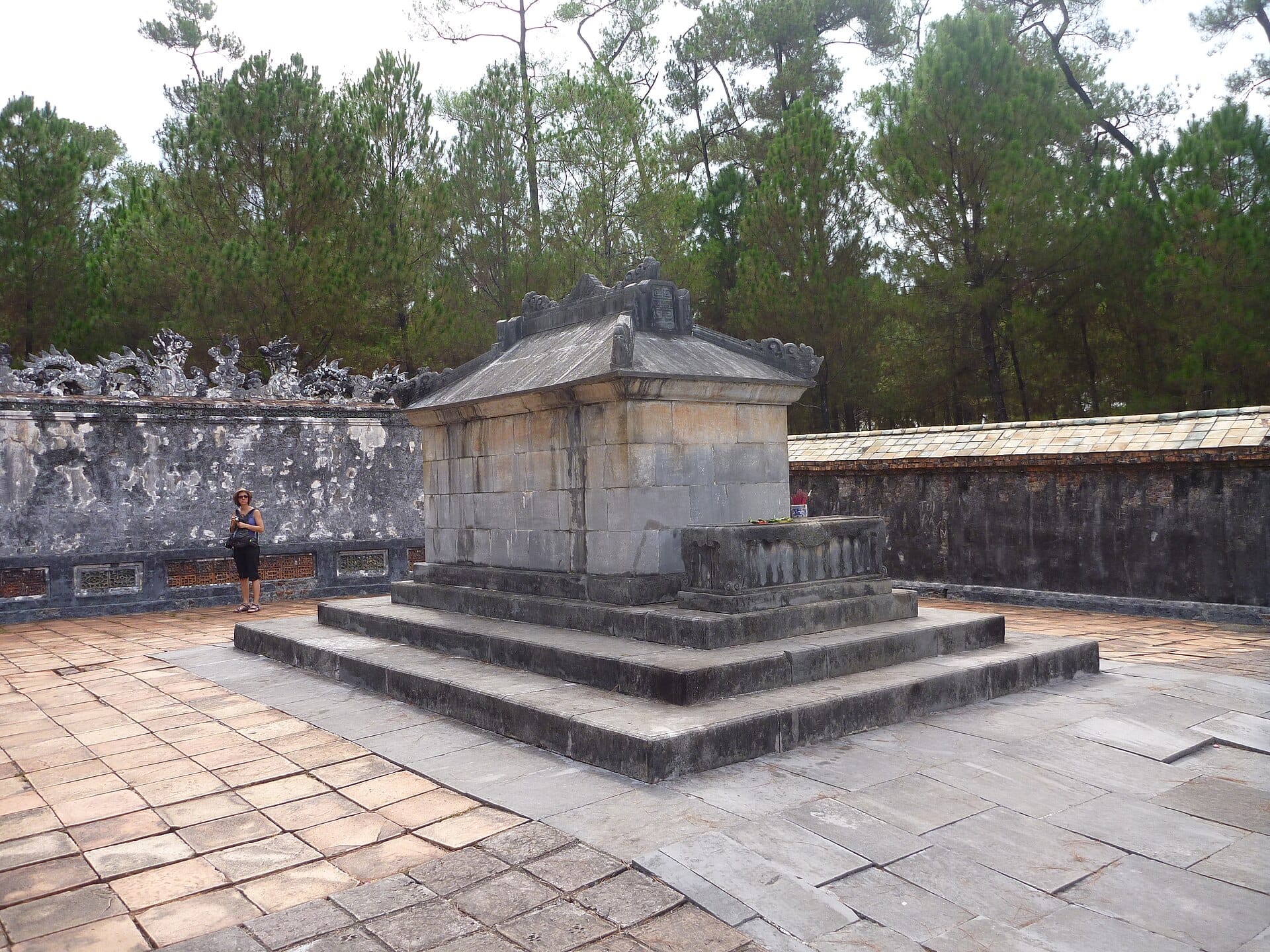 The stone sepulchre within the pine-forested Tomb of Tu Duc