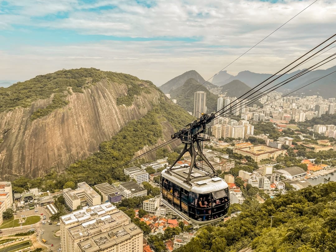 Cable car climbing to Sugarloaf Mountain over Rio de Janeiro