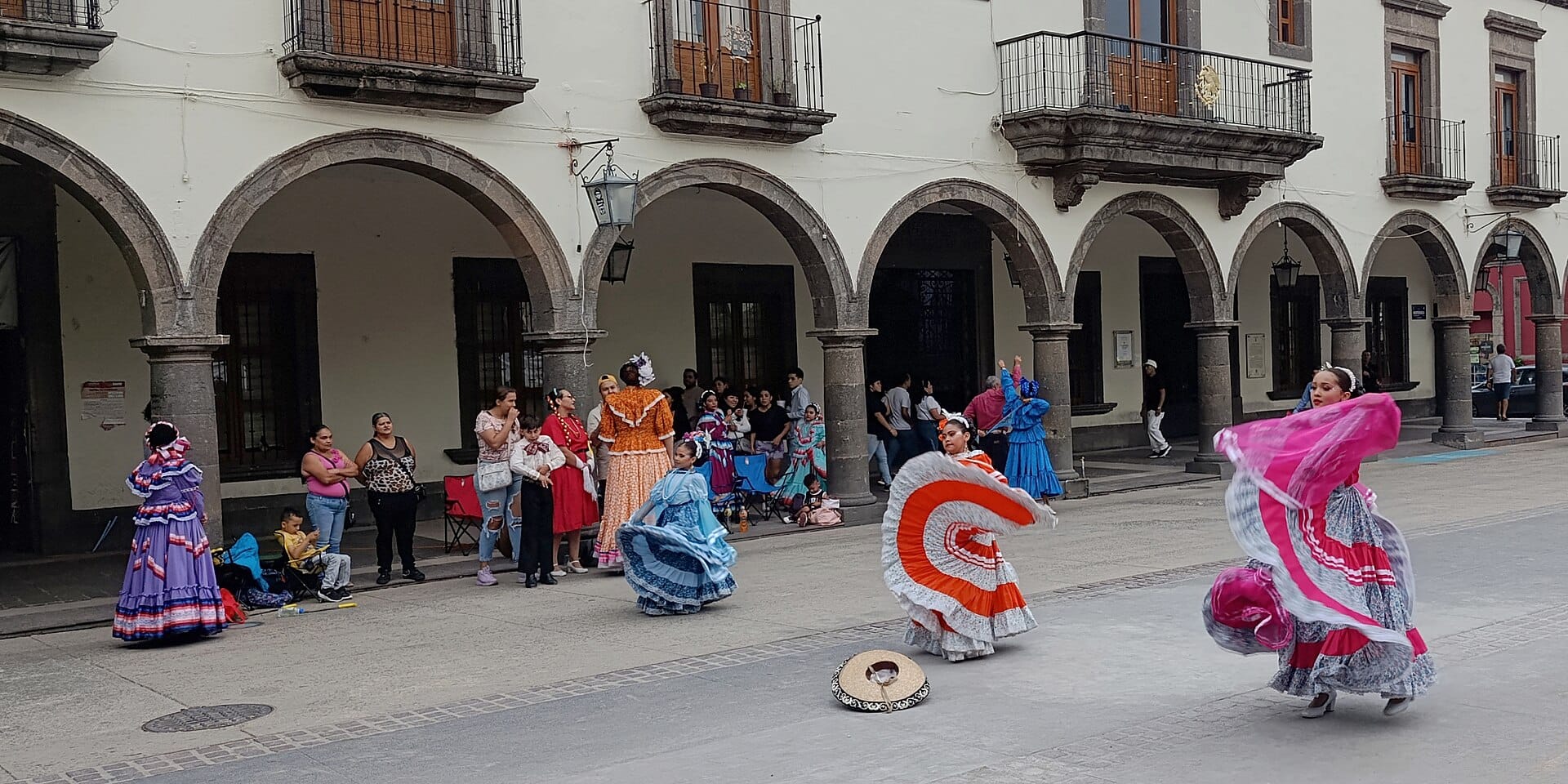 Folkloric dancers in traditional dress performing in Tlaquepaque, Jalisco
