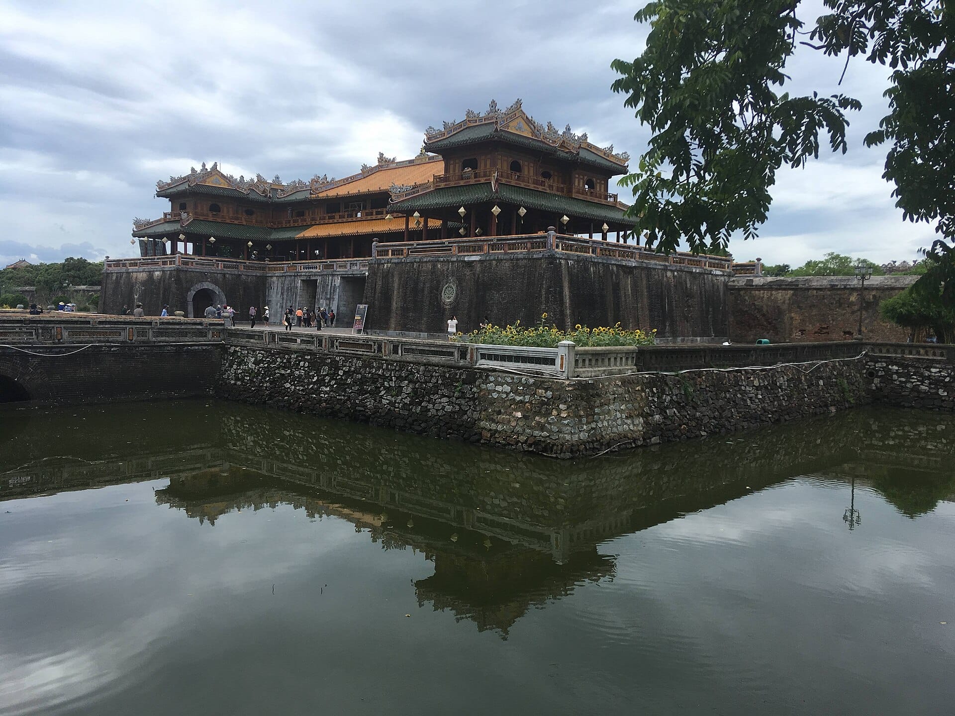 Ngo Mon Gate, the main entrance to Hue's Imperial City, reflected in the citadel moat