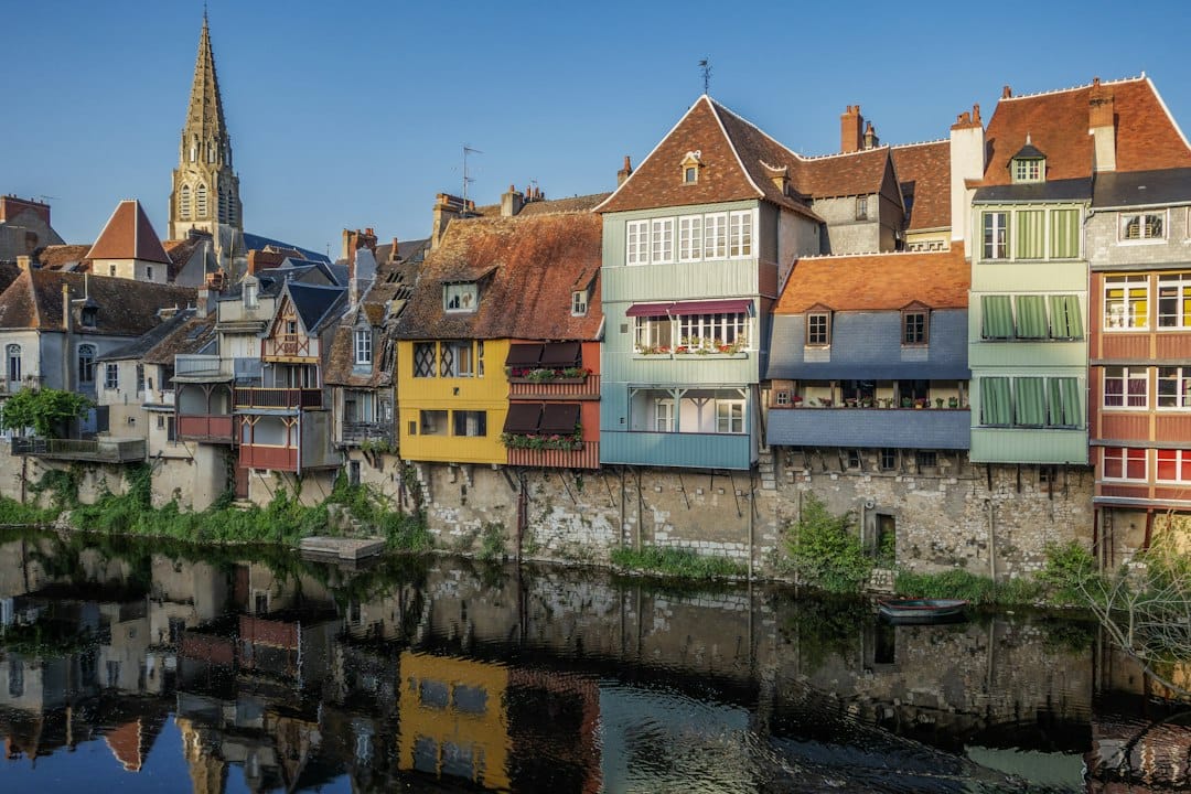 The Belfry of Ghent rising above the old town rooftops
