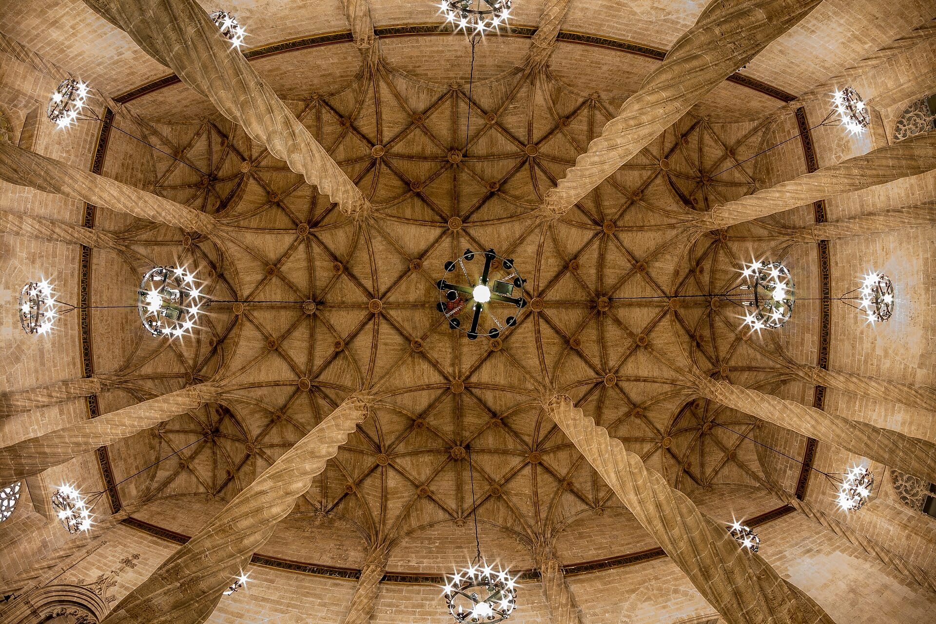 The twisting stone columns of the Gothic trading hall at La Lonja de la Seda