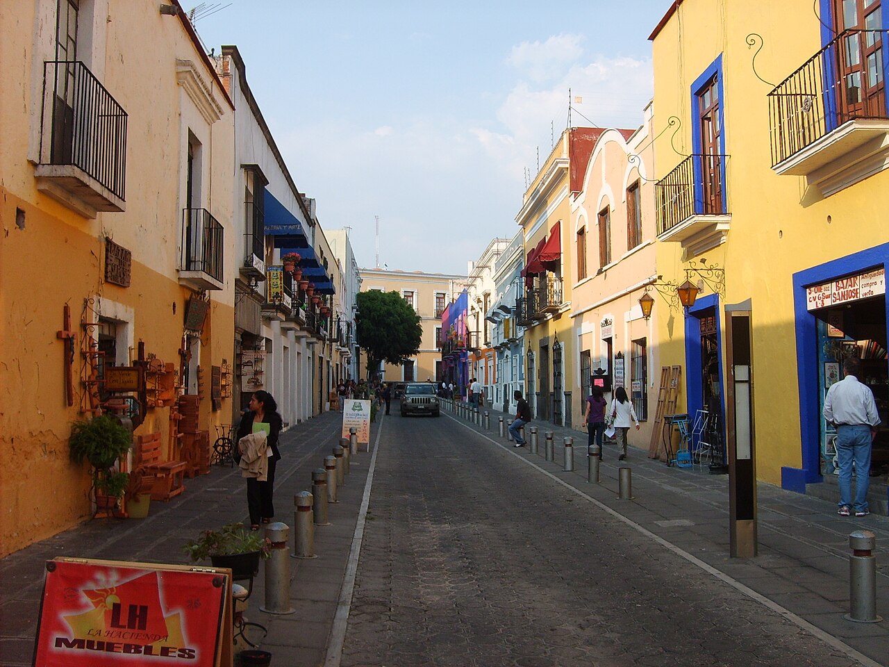 Colourful colonial street with antique shops in the Callejon de los Sapos, Puebla